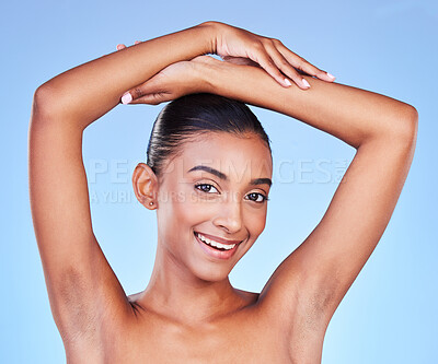 Buy stock photo Armpit, hair removal and woman in portrait with beauty, grooming and smile isolated on blue background. Hygiene, cleaning body and epilation with skincare, cosmetics and dermatology in a studio