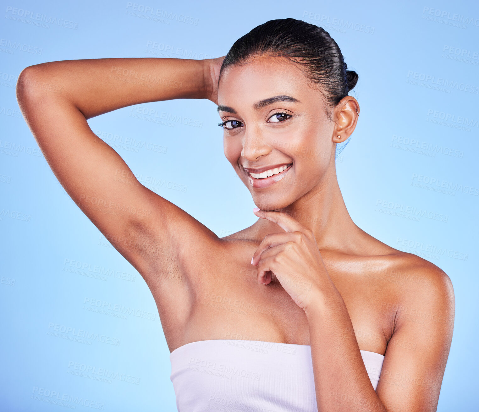 Buy stock photo Armpit, epilation and woman in portrait with beauty, grooming and smile isolated on blue background. Hygiene, cleaning body and hair removal with skincare, cosmetics and dermatology in a studio