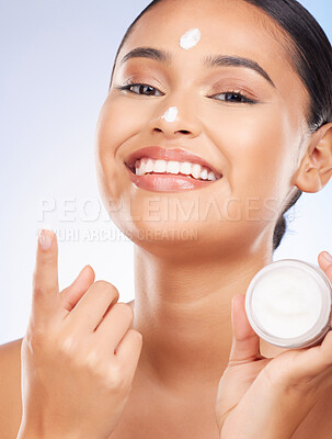 Buy stock photo Portrait, woman and smile for jar of face cream, dermatology and advertising lotion of glowing skincare on studio background. Model, facial beauty and container of moisturizer, sunscreen or cosmetics