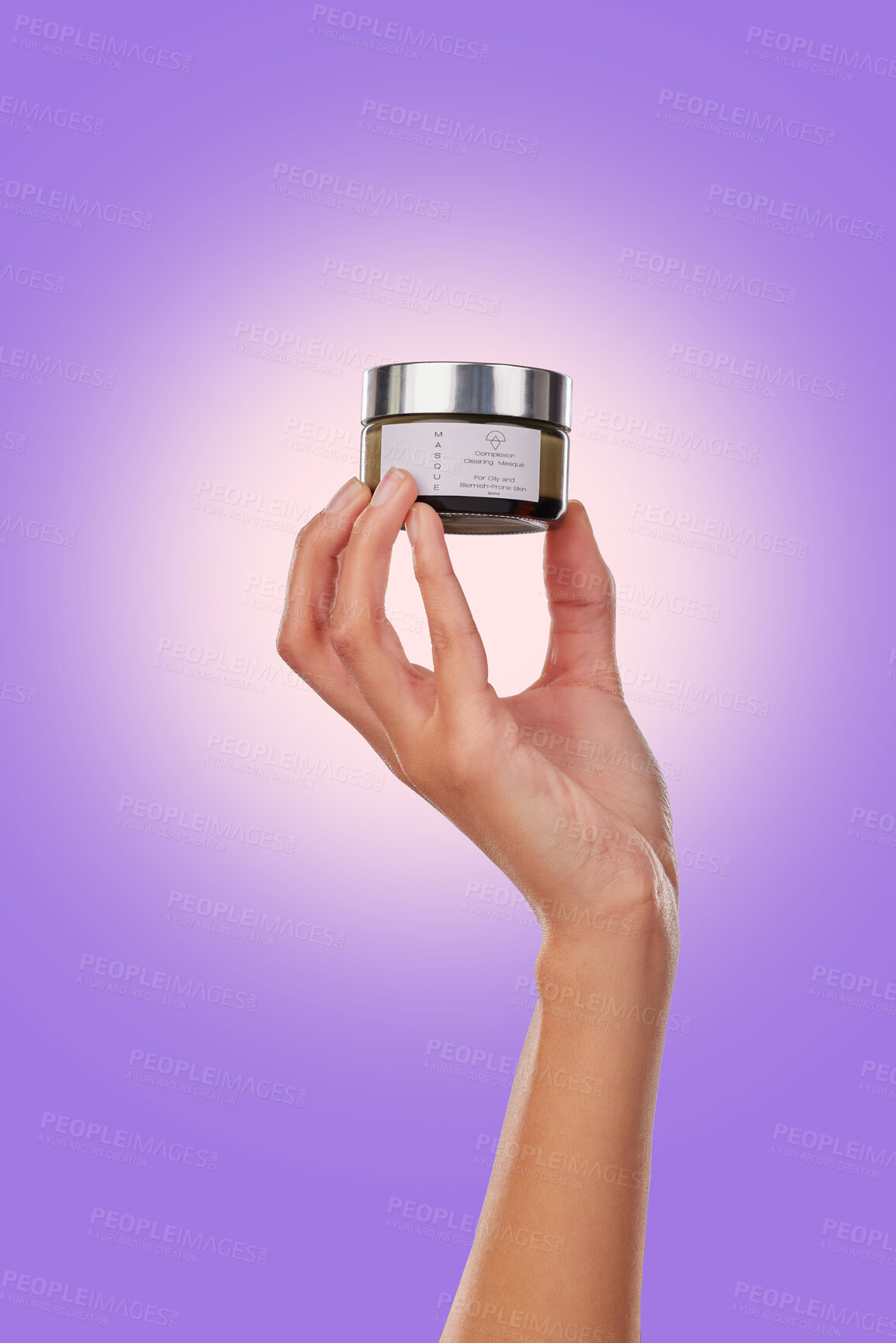 Buy stock photo Hand, cream with beauty and skincare, advertising product with dermatology isolated on purple background. Person with cosmetics serum for skin and promotion, container and facial mask in studio