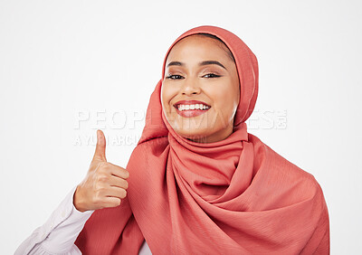 Buy stock photo Muslim woman, portrait and thumbs up with hijab in thank you, success or winning against a studio background. Happy female person, islam and scarf with like emoji, yes sign or OK in stylish approval