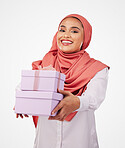 Woman, winner portrait and gift box, offer or prize for giveaway and shopping on a white background. Muslim person in Saudi Arabia with present, ribbon package and winning or competition in studio