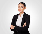 Crossed arms, smile and portrait of businesswoman in a studio with positive and confident attitude. Happy, professional and young Indian female corporate lawyer attorney isolated by white background.