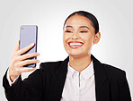 Selfie, business and woman with phone in hand, studio and social media for profile picture and online post. Happy, professional and person with smile for video call or networking on white background 