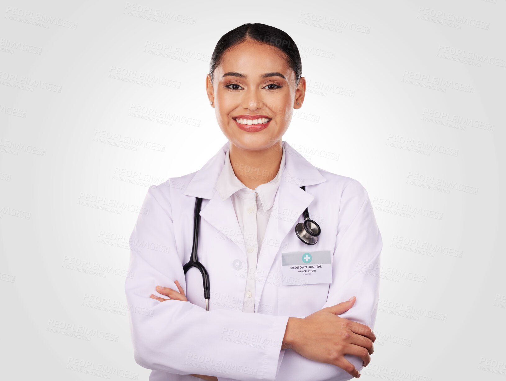 Buy stock photo Doctor, smile and portrait of woman with arms crossed, confidence and pride in medicine and healthcare on white background. Medical worker, person and professional in studio with stethoscope 