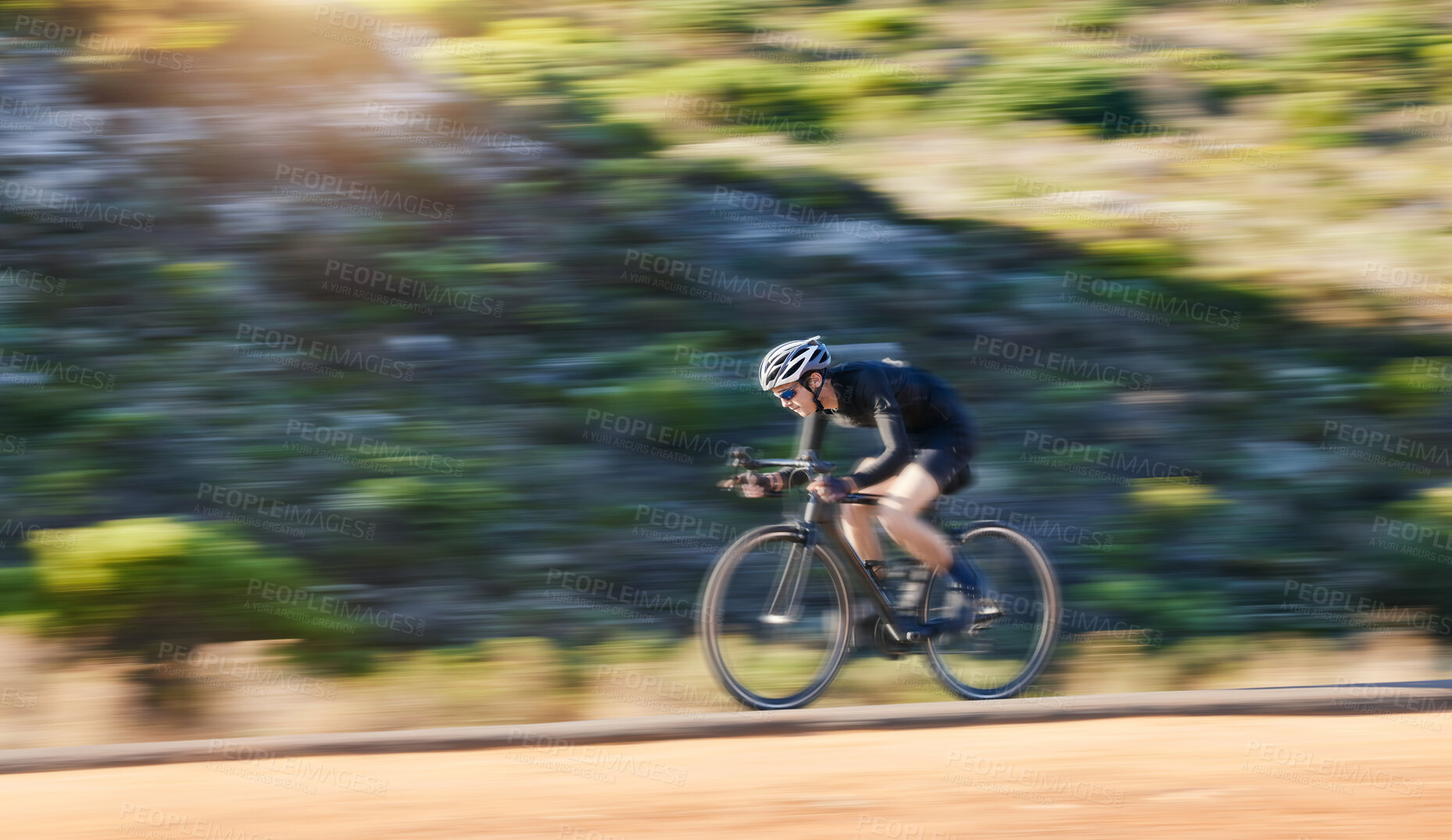Buy stock photo Motion blur, fitness and cyclist on bicycle on road in mountain with helmet, exercise adventure trail and speed. Cycling race, nature and man with bike for fast workout, training motivation or energy