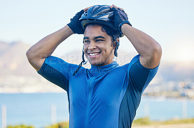 Buy stock photo Cycling helmet, exercise and a man outdoor for sports, workout or training with a happy smile. face of a young athlete or cyclist with safety, wellness and fitness at park or thinking of performance 
