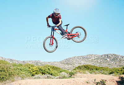 Buy stock photo Freedom, air and man cycling in nature training for a sports competition on trail or path on mountain. Action, stunt or cyclist athlete riding bicycle to jump for cardio exercise, fitness or workout
