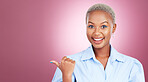 Pointing, portrait and a woman in studio with hand for advertising, marketing or announcement. Happy face of an excited African person on a pink background for choice, presentation or mockup space