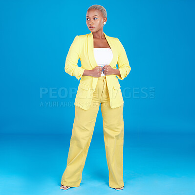 Buy stock photo Corporate, business woman and entrepreneur in studio assertive for career, job and startup on blue background. Professional, fashion and creative young person with confidence, pride and ambition 