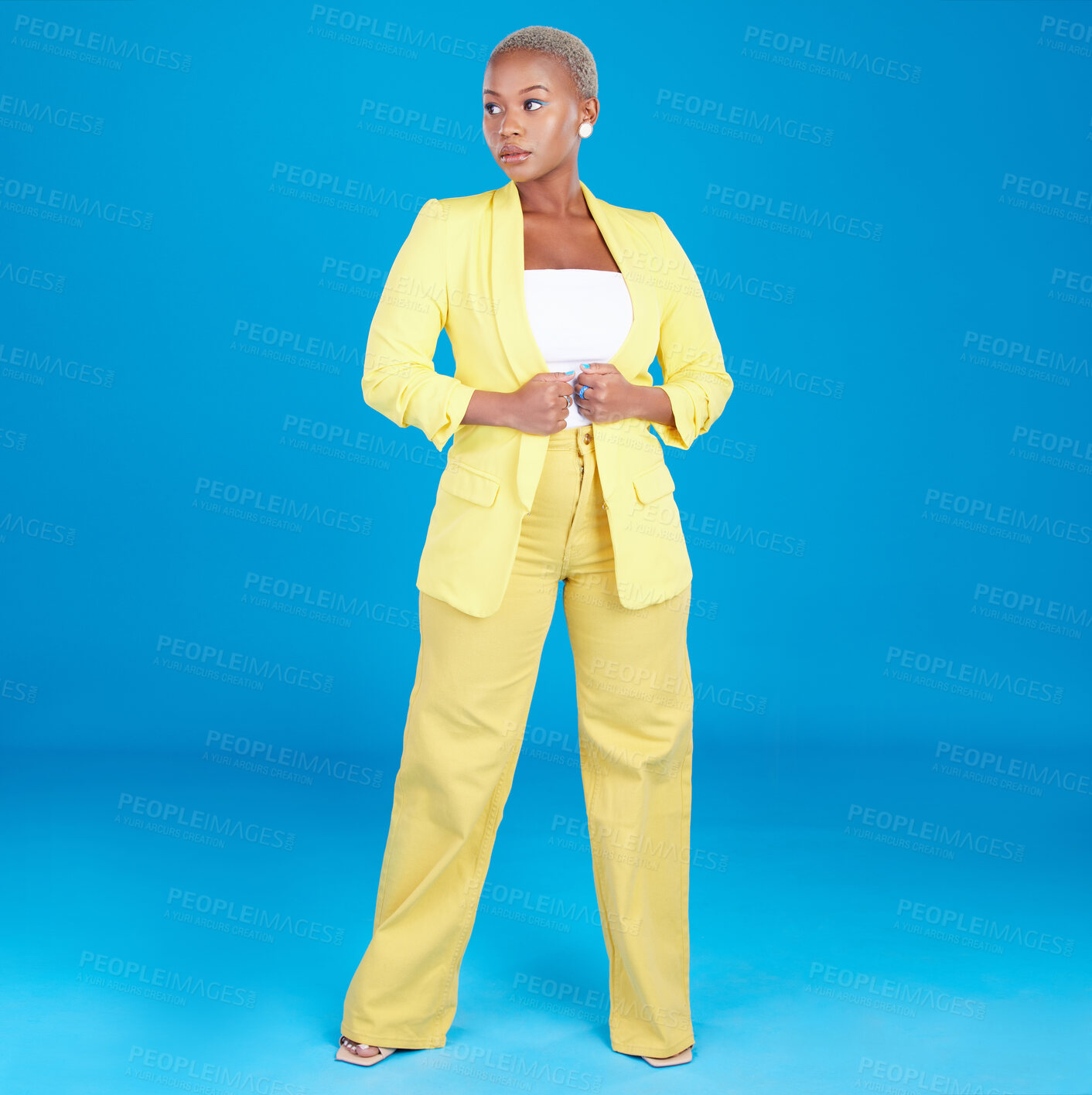 Buy stock photo Corporate, business woman and entrepreneur in studio assertive for career, job and startup on blue background. Professional, fashion and creative young person with confidence, pride and ambition 