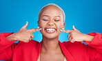 Happy, makeup and young black woman with a smile in a studio with an excited, confident or positive attitude. Beauty, sweet and African female model with cosmetic face isolated by a blue background.