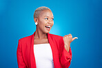 Pointing, surprise and a woman in studio with hand for advertising, marketing or announcement. Happy face of an excited African person on a blue background for choice, presentation or promotion