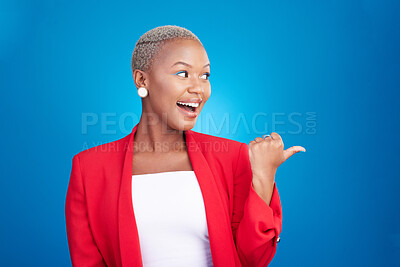 Buy stock photo Pointing, surprise and a woman in studio with hand for advertising, marketing or announcement. Happy face of an excited African person on a blue background for choice, presentation or promotion