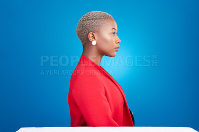 Buy stock photo Profile, mockup and a business black woman in a red suit on blue background in studio as a professional. Vision, mindset and space with a serious corporate employee looking to a future of management
