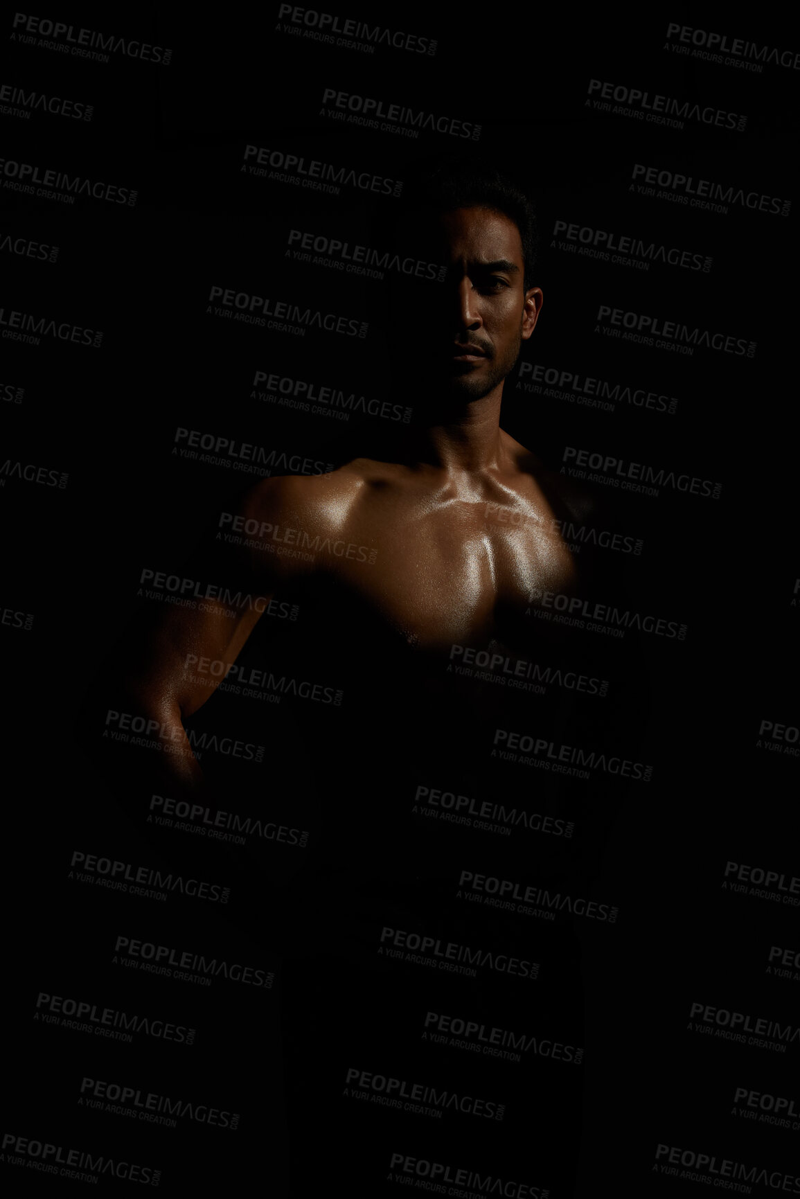 Buy stock photo Topless, muscle and portrait man in dark background for fitness inspiration, beauty aesthetic or strong body. Shadow aesthetic, topless male model or body builder in creative studio with art lighting