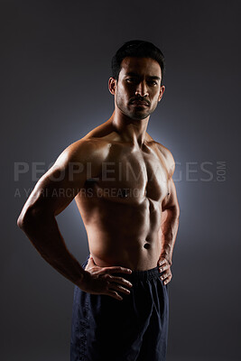 Buy stock photo Confidence, muscle and portrait of man on dark background for fitness inspiration, beauty aesthetic or strong body. Shadow aesthetic, male sports model or muscular bodybuilder in studio lighting.