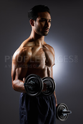 Buy stock photo Fitness, dark and a man with weights on a black background for muscle, health and exercise. Sports, idea and an Asian bodybuilder or strong athlete doing weightlifting for training with power