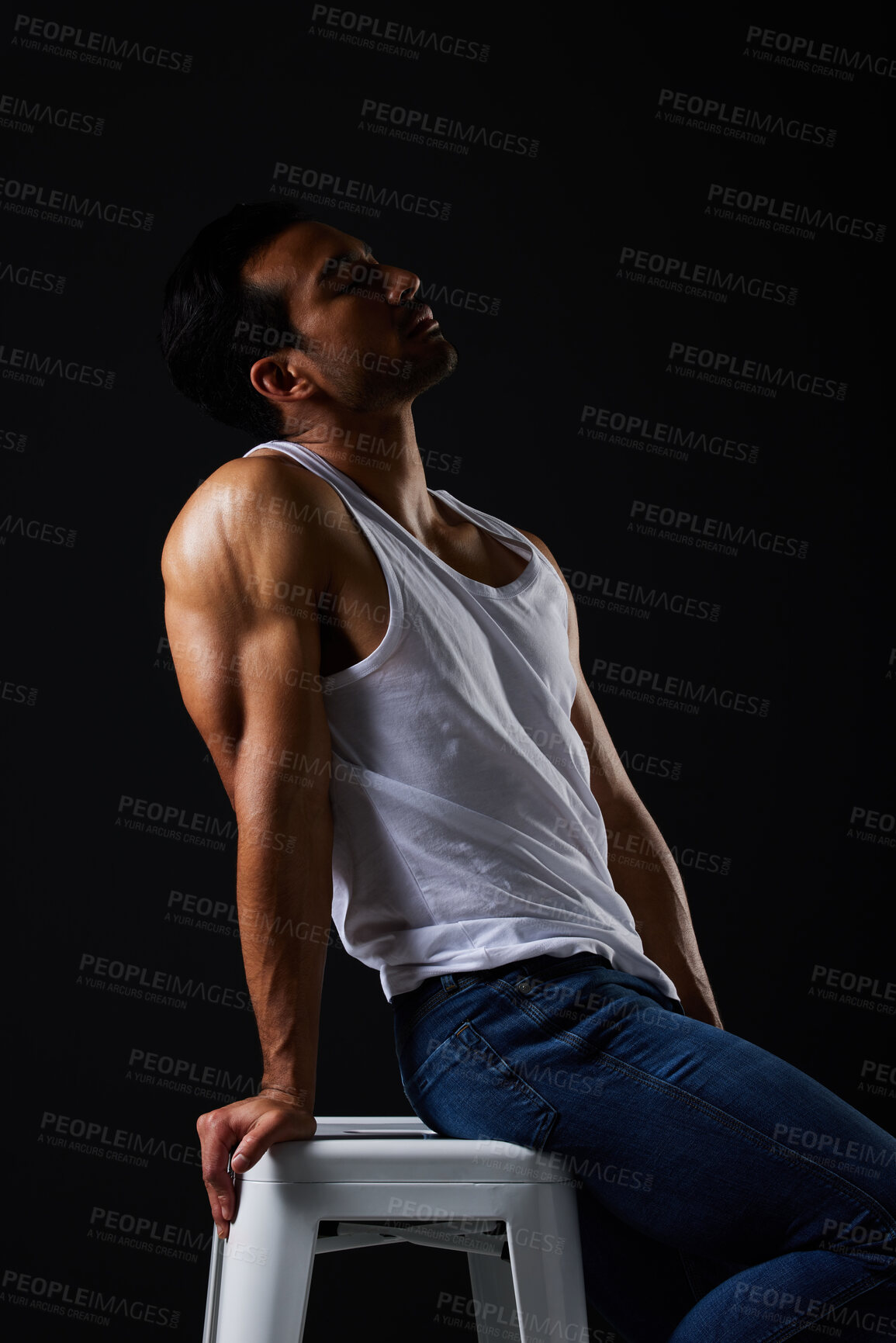 Buy stock photo Sexy, muscle and man on chair in studio with fitness inspiration, beauty aesthetic and sensual fashion. Erotic art, sexual body and male model sitting on black background, thinking in dark lighting.