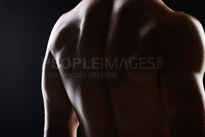 Buy stock photo Strong back, dark studio and person with ripped body, fitness transformation goals and muscle building results. Bodybuilder training exercise, shadow light and muscular athlete on black background