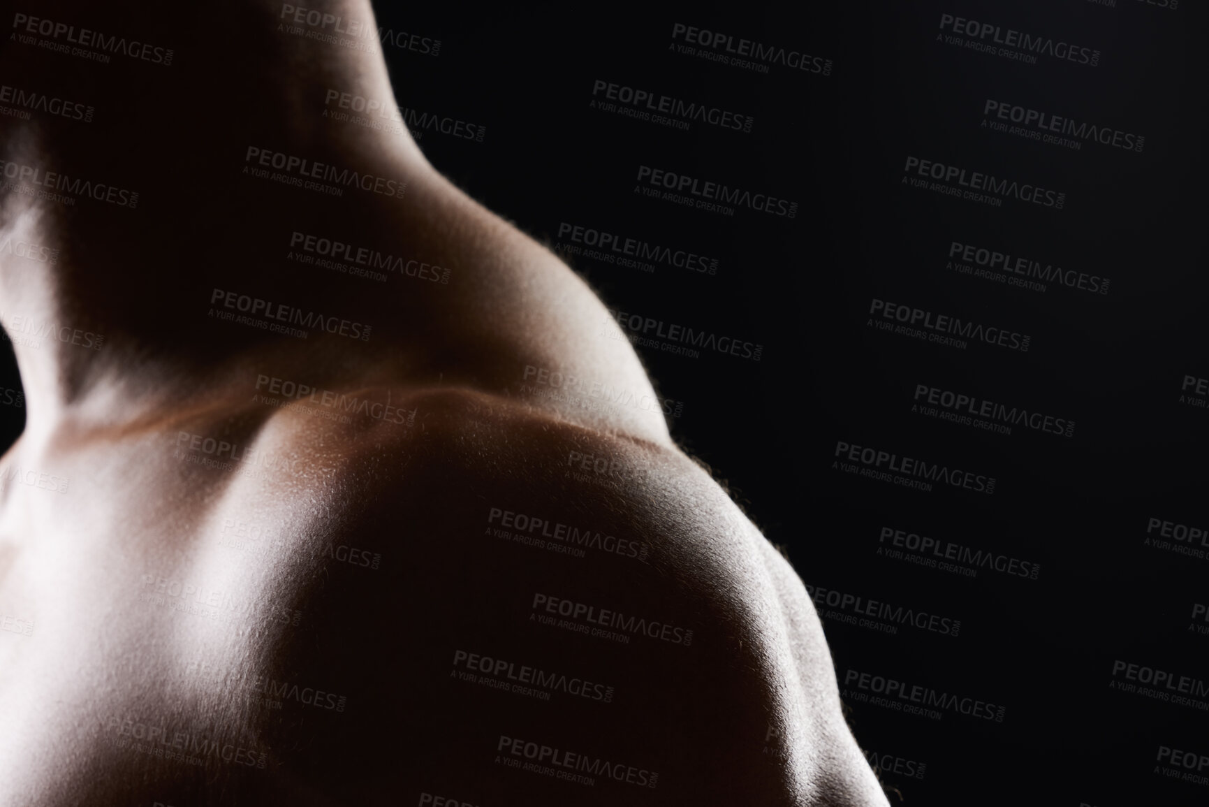 Buy stock photo Shoulder, closeup and strong muscle of man in studio isolated on black background mockup space. Body, fitness athlete and arm of model, bodybuilder power and workout for health, wellness and exercise