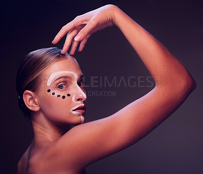 Buy stock photo Woman, beauty and paint in studio portrait, profile or art for wellness, fantasy or cosmetic by dark background. Girl, model and facial painting for skin, creativity or pattern with makeup for change