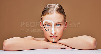 Buy stock photo Portrait, creative and woman with makeup, art and cosmetics on a brown studio background. Face, person or model with beauty, mockup space or Canada with aesthetic, expression or fantasy with skincare