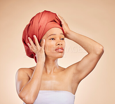 Buy stock photo Hair, scarf and black woman in studio for wellness, beauty or natural cosmetics on brown background. Headwrap, pride and African lady model with glowing or skincare satisfaction, results or treatment