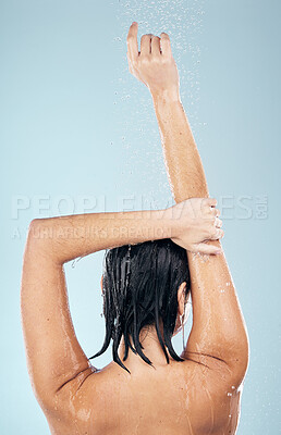 Buy stock photo Shower, studio and woman cleaning back, hair or body for wellness on mock up space on blue background. Fresh, water or wet person washing and grooming for healthy natural hygiene or skincare to relax