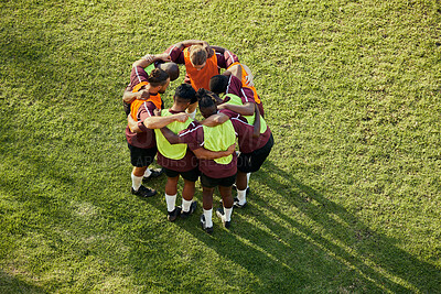 Buy stock photo Top view, soccer and team with huddle, people and fitness with support, wellness and cooperation. Group, athletes and friends with hug, exercise and motivation with collaboration with competition