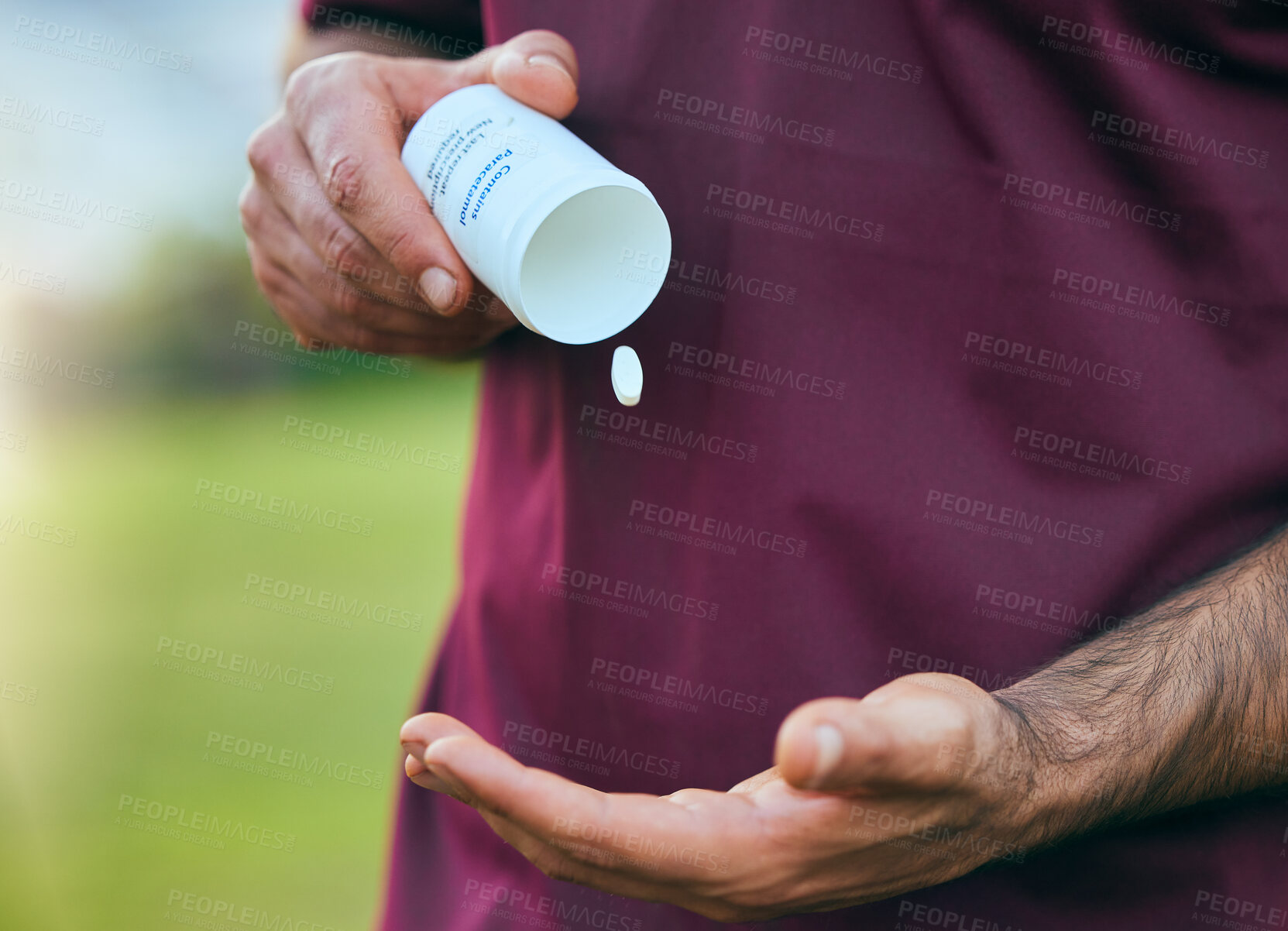 Buy stock photo Pill box, medicine and man hand closeup of a sport on a soccer field with tablet and drugs for health. Supplements, container and outdoor with an athlete holding wellness and paracetamol medication