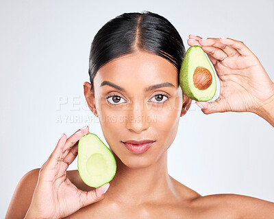 Buy stock photo Portrait, avocado and woman with natural beauty, facial and eco friendly skincare isolated on white background. Wellness, dermatology and vegan cosmetics product with glow, shine and green in studio