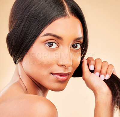Buy stock photo Strong hair, portrait and woman with beauty, self care and glow from collagen in shampoo or cosmetics on studio background. Indian, face and model with haircare, treatment or healthy texture or shine
