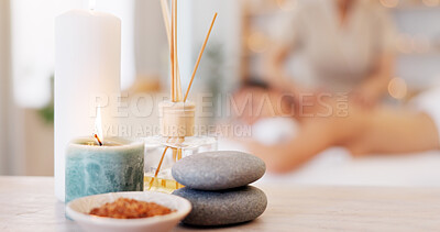 Buy stock photo Spa, rock and candle to relax in a room with atmosphere, mood or ambience in a health club. Wellness, luxury and treatment with still life objects on a table in a clinic for rest and relaxation