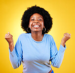 Woman, portrait and fist in studio of success, celebrate promotion or winning lottery bonus on yellow background. Happy african model, cheers or celebration of achievement, deal or lotto prize winner