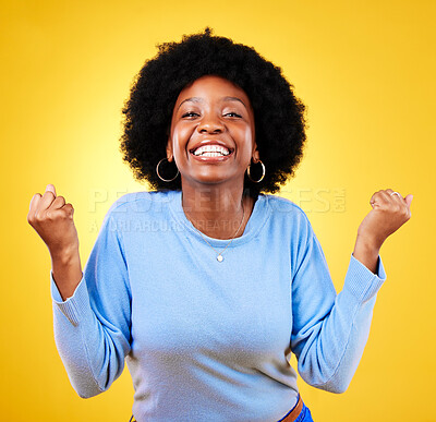 Buy stock photo Woman, portrait and fist in studio of success, celebrate promotion or winning lottery bonus on yellow background. Happy african model, cheers or celebration of achievement, deal or lotto prize winner