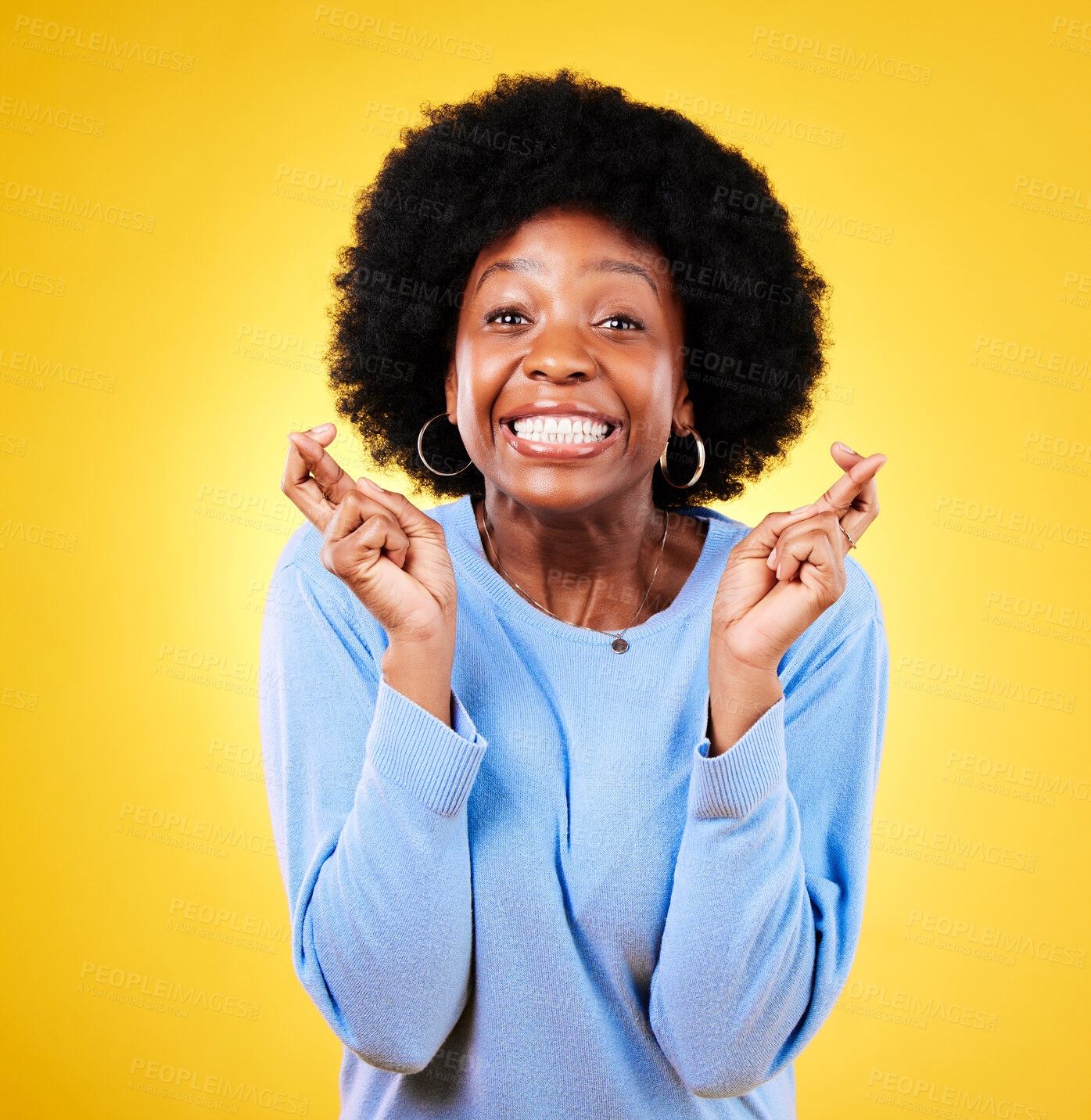 Buy stock photo Woman, fingers crossed and excited portrait in studio for hope, trust and optimism for winning, prize and lottery. African model wish for luck, bonus promotion or giveaway winner on yellow background