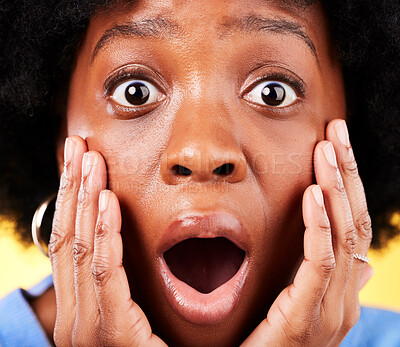 Buy stock photo Scared, shock and surprised woman in studio for fear, mental health or closeup. Portrait of African person on yellow background with mouth open, hands on face with a phobia, gossip news or horror