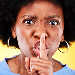 Angry portrait, woman and secret on lips in studio for privacy, drama and noise on yellow background. Face of annoyed african model warning with finger emoji for whisper, quiet reaction or voice sign