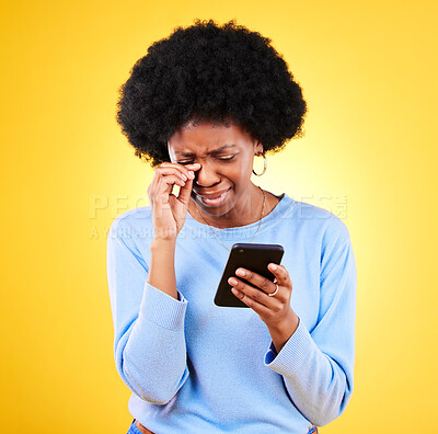 Buy stock photo Sad, fraud and woman with phone scam and identity theft problem and tech in studio. Stress, mobile error and confused from phishing, hacking and ecommerce spam with anxiety and yellow background