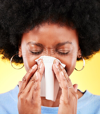 Buy stock photo Nose, face and sneeze of sick woman in studio for cold, allergies and medical virus on yellow background. African model, tissue and ill health from sinusitis, allergy and bacteria of winter infection