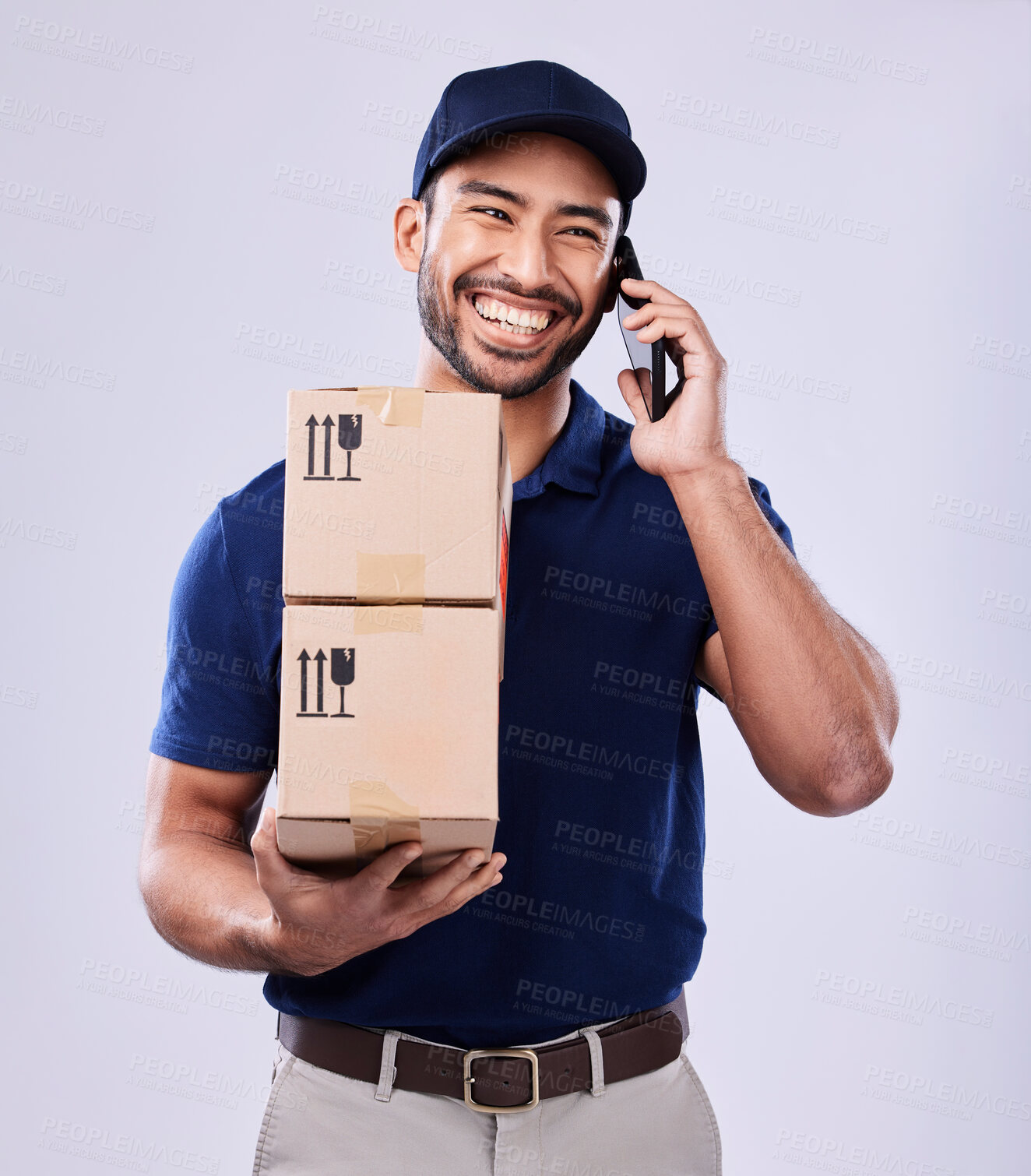 Buy stock photo Phone call, shipping box and happy delivery man on conversation, studio discussion or talk to courier contact. Distribution service, cellphone communication or supply chain person on white background