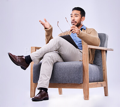 Buy stock photo Tablet, explain and a man psychologist in a chair on a white background in studio to listen for diagnosis. Psychology, mental health and information with a person counseling during a therapy session