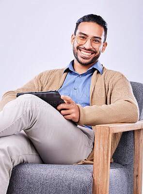 Buy stock photo Portrait, tablet and psychology with a man in a chair on a white background in studio to listen for diagnosis. Psychologist, mental health and smile with a happy person counseling during therapy