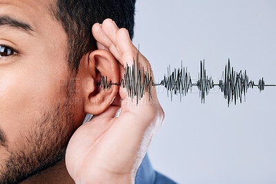 Buy stock photo Ear, listening and sound waves with a hand on a studio background for communication, gossip or attention. Closeup, digital and a person for hearing an audio, speaker or frequency for conversation