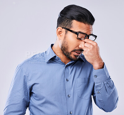 Buy stock photo Tired, crisis and man with a headache on a studio background for mental health or burnout. Anxiety, sick or an Asian businessman with migraine pain from depression, mistake or frustrated with a fail