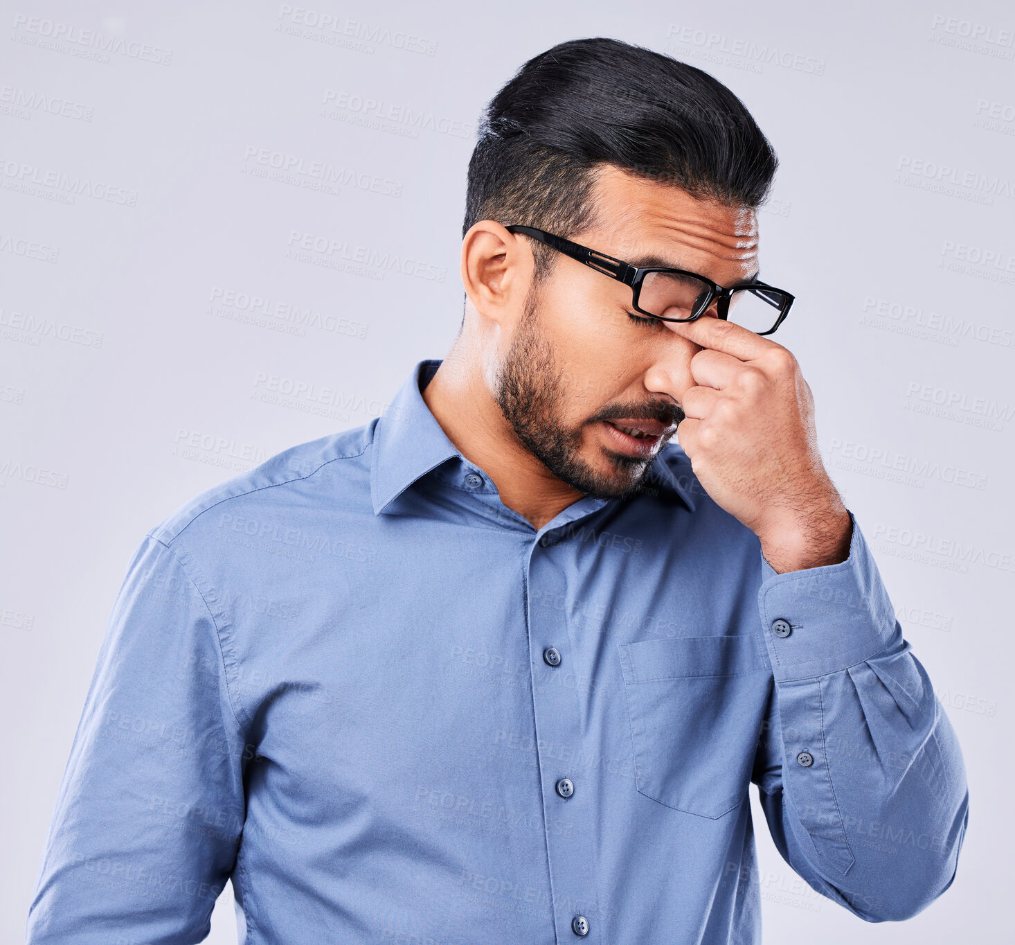 Buy stock photo Tired, crisis and man with a headache on a studio background for mental health or burnout. Anxiety, sick or an Asian businessman with migraine pain from depression, mistake or frustrated with a fail