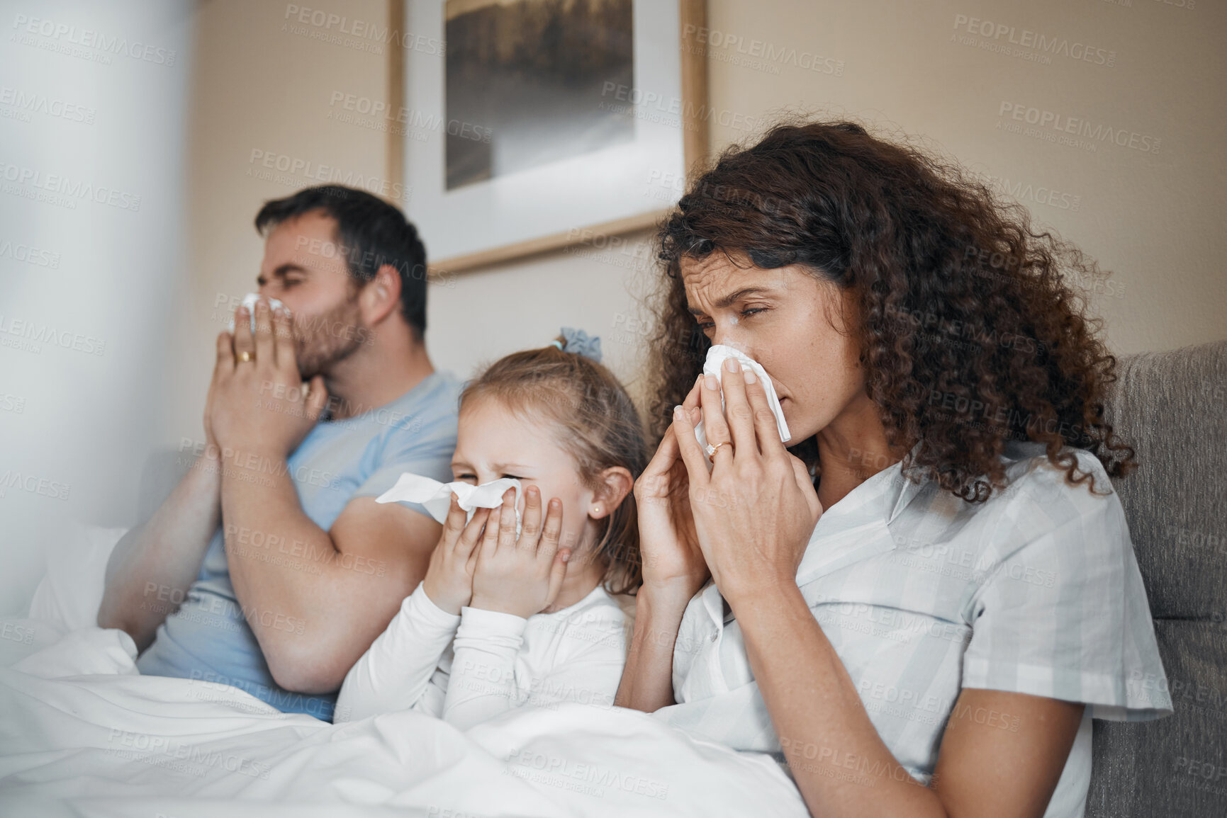 Buy stock photo Parents, girl and bed with tissue, blowing nose and sick together with allergies, flu or covid in house. Father, mother and daughter with toilet paper, cleaning and hygiene for sneeze in family home