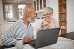 Laptop, coffee and senior couple in conversation browsing on social media, website or internet. Technology, bond and elderly man and woman in retirement with cappuccino talking with computer at home.