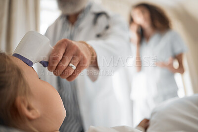 Buy stock photo Sick, thermometer and doctor with child in bedroom for consulting, virus and medical checkup. Healthcare, helping and fever results with people in family home for inspection, wellness and exam